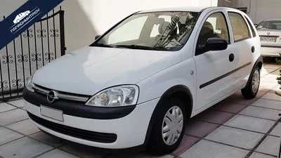 Car, Opel Corsa 1.3 CDTI, small approx., Limousine, model year 2003-,  silver, driving, side view, country road Stock Photo - Alamy