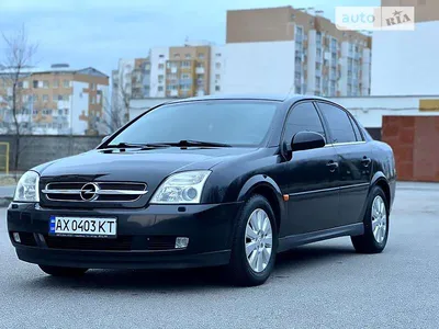 Opel Vectra 2002 (2002 - 2005) reviews, technical data, prices