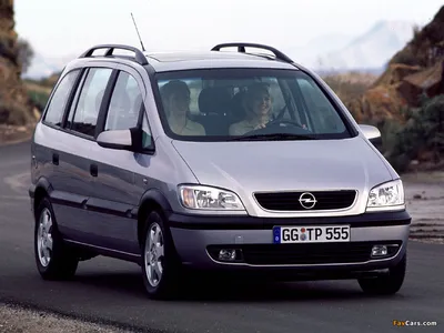 Car, Opel Zafira 2.2 DTI, model year 2003-, silver, Van, driving, side  view, country road Stock Photo - Alamy