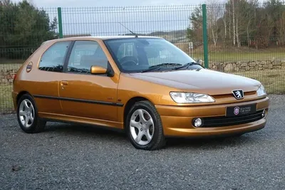 Foreign hatchback spotted on the street of Montreal, Canada: diplomatic Peugeot  306