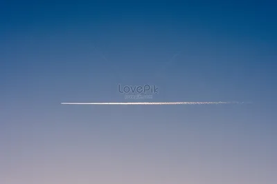 Спортивный самолет в небе и след от него Stock Photo | Adobe Stock