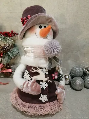 Уютные фото Снеговика и снежной бабы для зимнего настроения