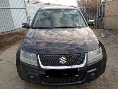 Золотистый Suzuki Grand Vitara 2008 года с пробегом по цене 995 000 руб. в  Новосибирске