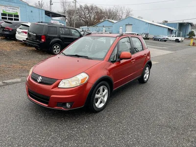 2008 Suzuki SX4 Sport in Silver - Low/Wide Front Stock Photo - Alamy