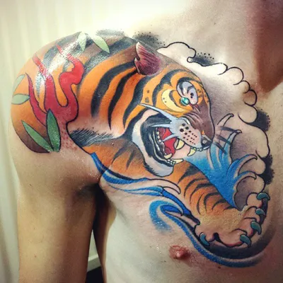 Татуировка тигра на плече: значение, идеи и история - fotovam.ru