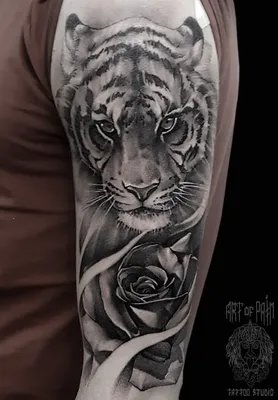 Татуировка тигра на плече – символ силы и мощи - tattopic.ru