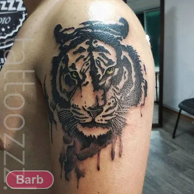 фото мужской татуировки на руке в стиле графика реализм житвотное тигр /  Тату салон «Дом Элит Тату»