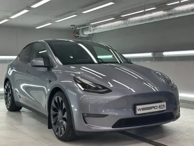 Самый популярный электрический автомобиль в мире Tesla Model 3 с описанием,  преимуществами и недостатками.