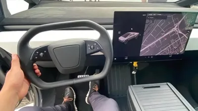 Рассекречен салон серийного Tesla Cybertruck: большой экран, руль-штурвал и  ничего больше - читайте в разделе Новости в Журнале Авто.ру