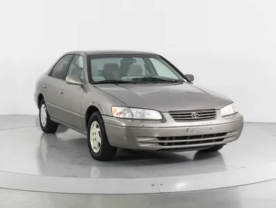 1998 Toyota Camry with 18x9.5 35 ESR Sr09 and 215/40R18 Achilles At Sport  and Coilovers | Custom Offsets