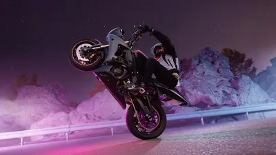 Трюками к успеху: магнетизирующие фото на фоне мотоциклов